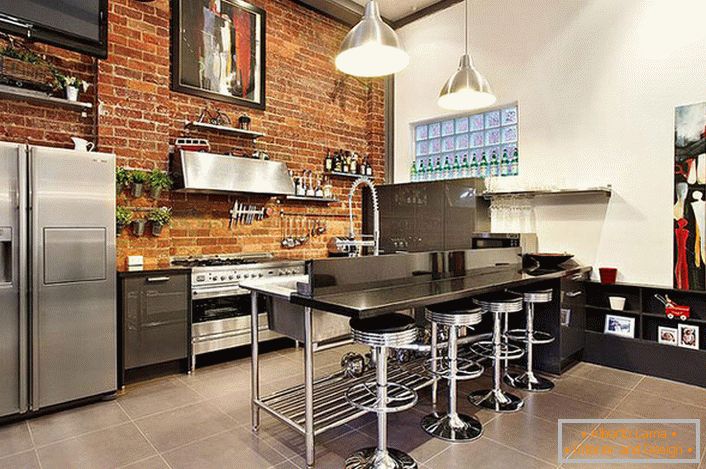 Steel, chrome furniture fits perfectly into the kitchen setting in loft style. Correctly organized space is not only practical and functional, but also cozy.