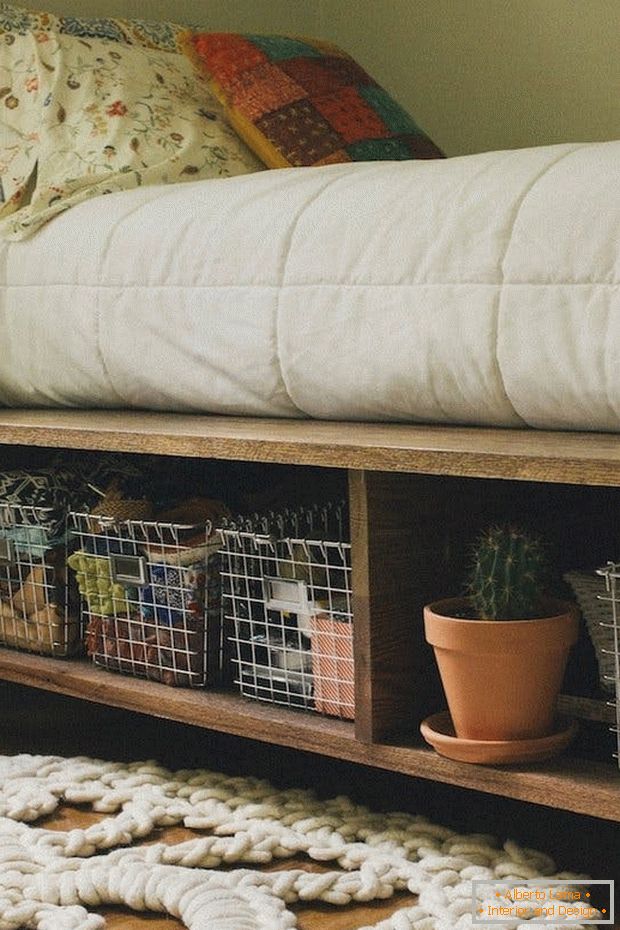 Storage under the bed to increase the space in the bedroom