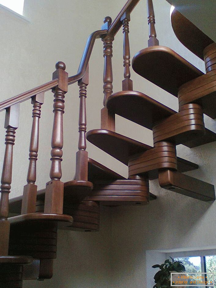 Elegant modular staircase for the interior of the house in a classic style.