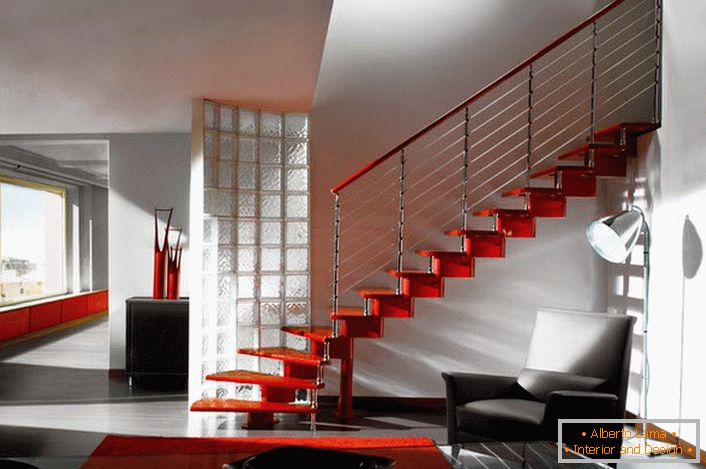 An elegant example of a flight of stairs for the interior of the house in the style of high-tech. If desired, you can put another support in the middle of the span.