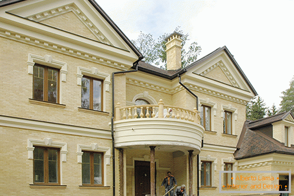 Facade of houses with polyurethane stucco decoration