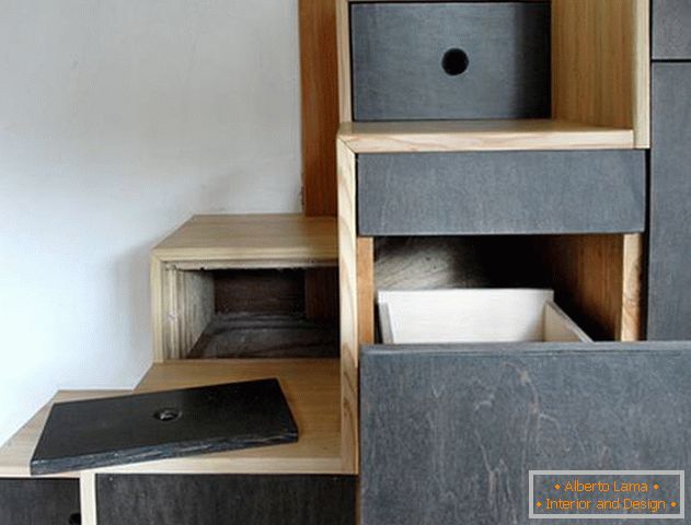 Interior of the house on wheels: storage system in the steps