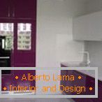 Design of a white and purple kitchen with a window