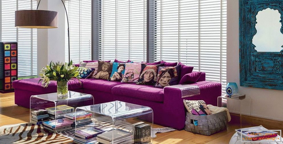 Colorful cushions on purple sofa