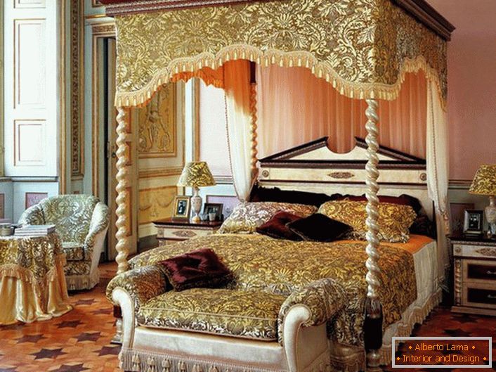 Elegant spacious bedroom with canopy above the bed.