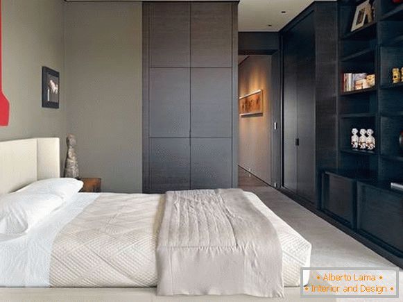 Stylish bedroom design with wardrobe with built-in furniture