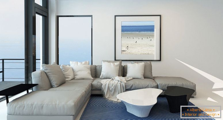 Modern waterfront living room with a bright airy lounge interior with a comfortable modern upholstered grey suite , art on the wall and a large panoramic view window along one wall overlooking the ocean