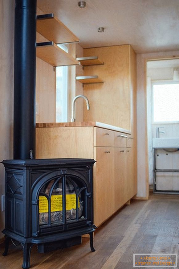 Fireplace in a small cottage on wheels