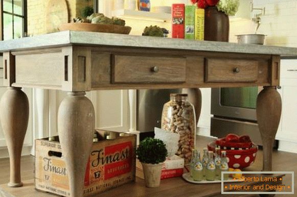 Wooden table island for kitchen photo