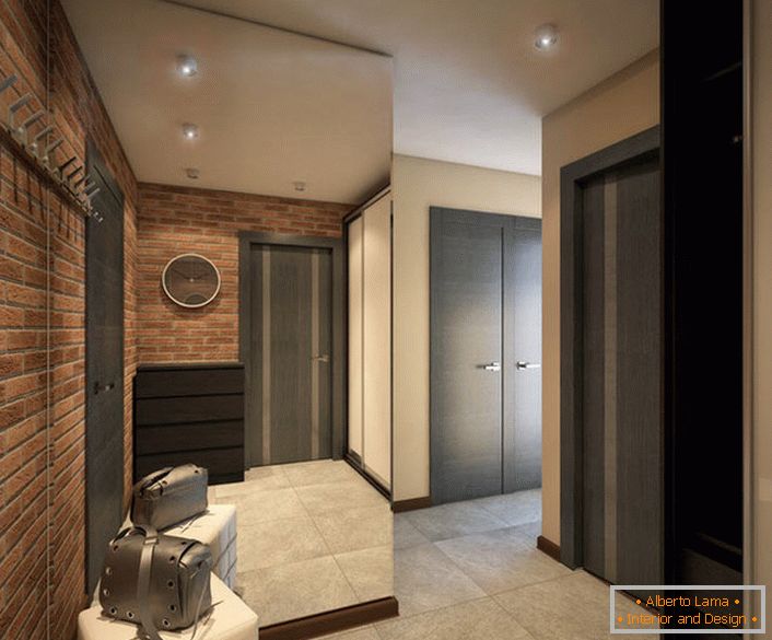 The design project of the hallway is a neat version of the loft style (brick wall) and the color of a noble wenge.