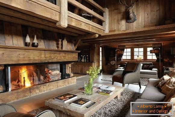 Luxury finishing of a wooden house inside in the spirit of a chalet