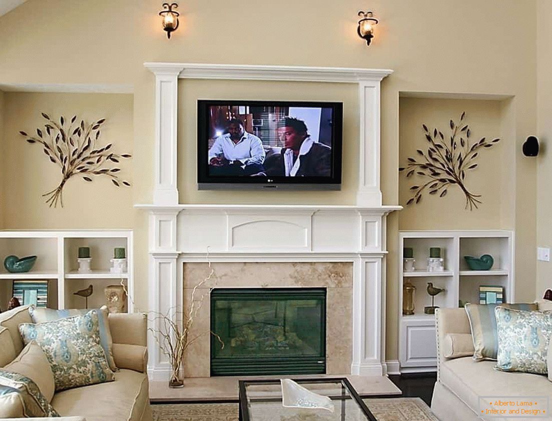 The living room with a fireplace decorated with stucco molding