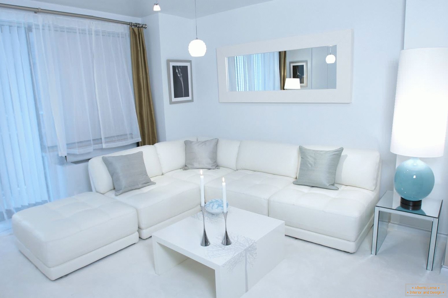 White corner sofa with gray pillows