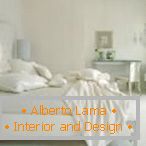 Bed with white bed linen