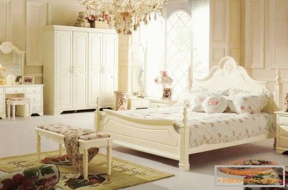 Bedroom in Provence style with crystal chandelier