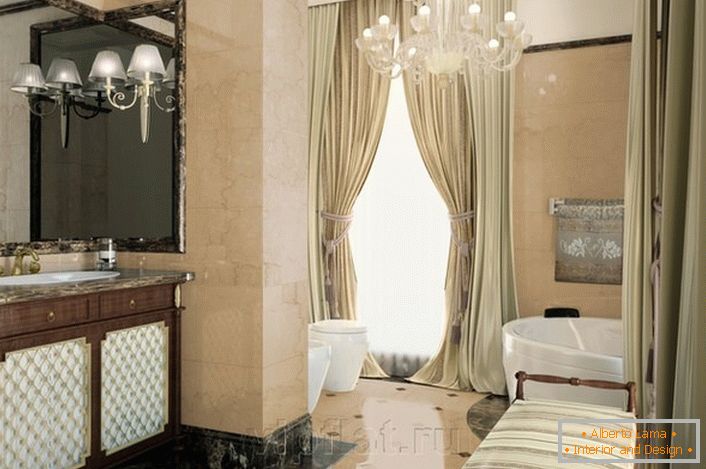 Noble decoration of the bathroom in the neoclassicism style is emphasized by properly selected furniture.