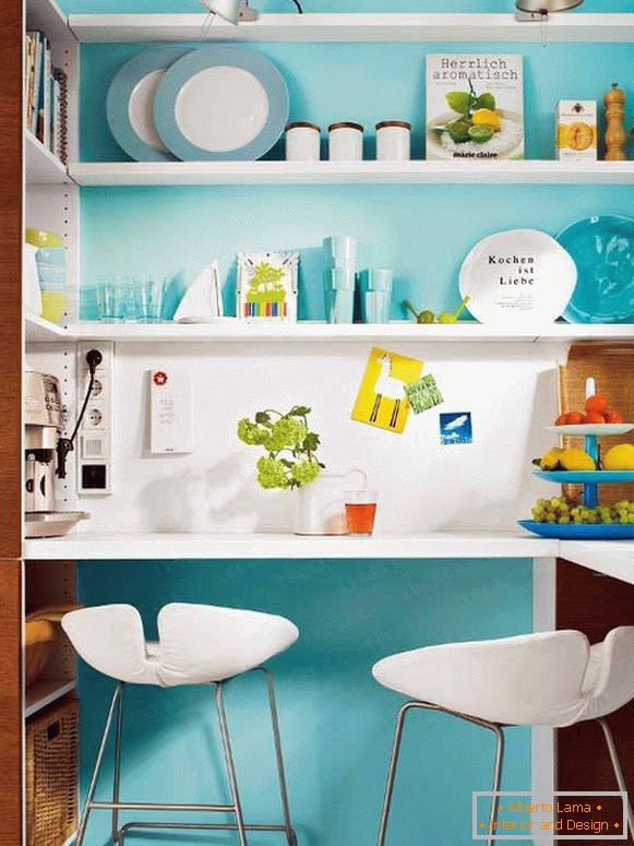 Interior of a small kitchen in turquoise color