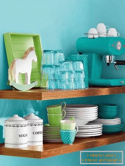 Bright dishes in a small kitchen in turquoise color