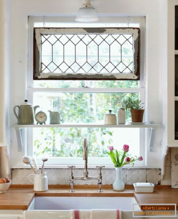 Shelf on the window in the kitchen