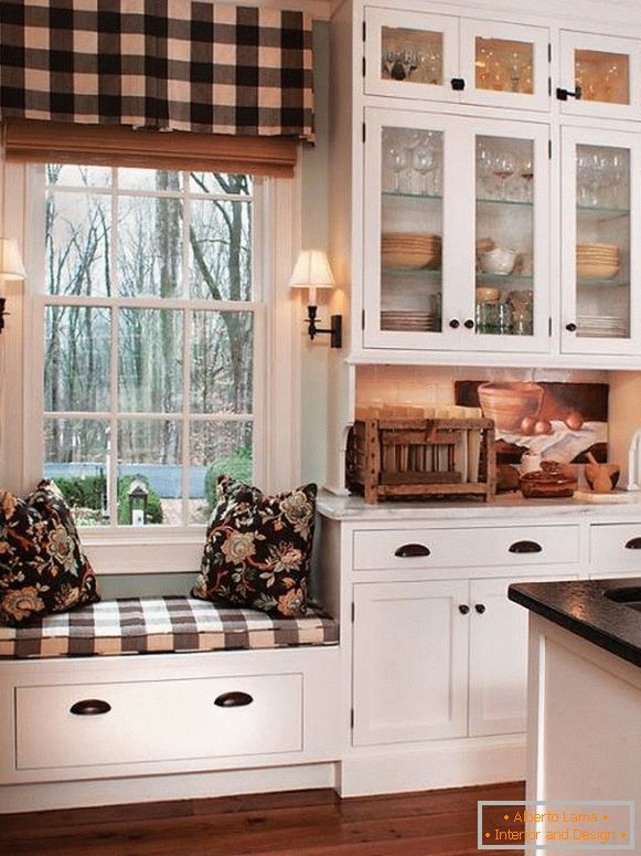 A small banquet at the window in the kitchen