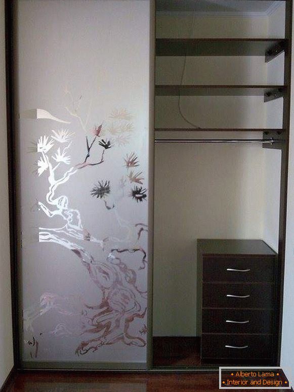 Glass matte doors for the built-in wardrobe compartment with a picture