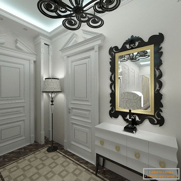 Art deco style likes light shades in the interior. The entrance, decorated in white, is notable for correctly selected contrast decorative elements.