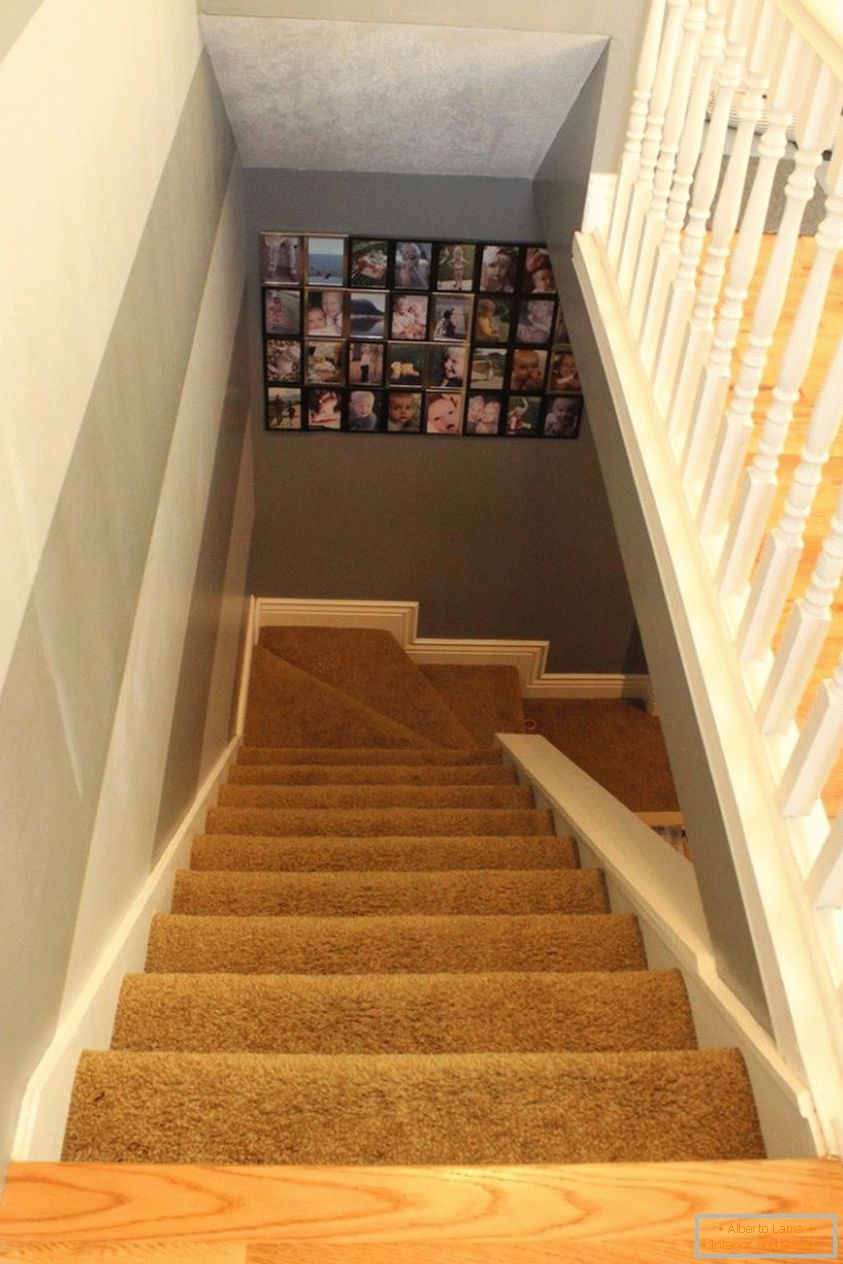 Stairs with an old carpet before work starts