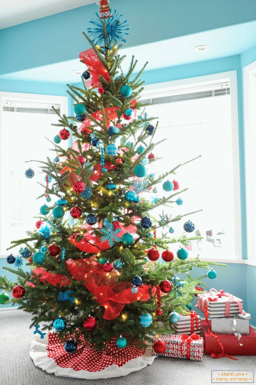 Decoration of the Christmas tree in blue and red colors