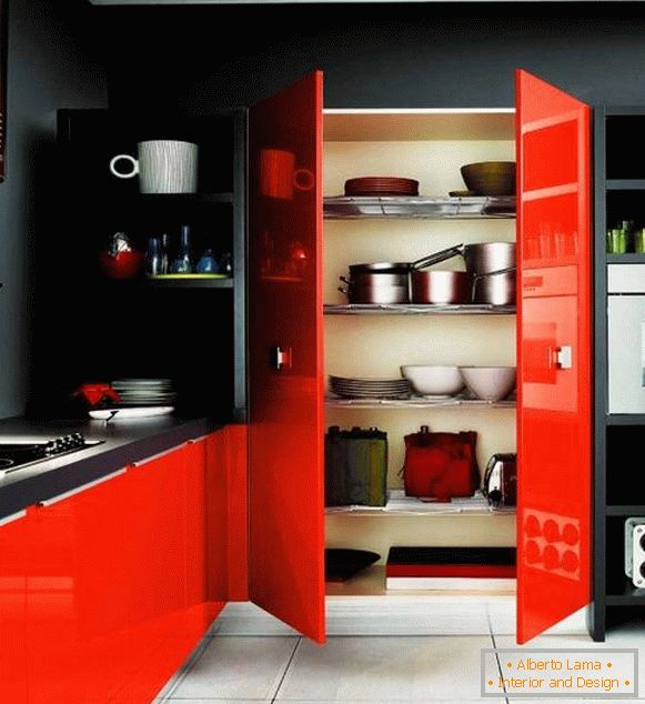 Black walls and red furniture in kitchen design
