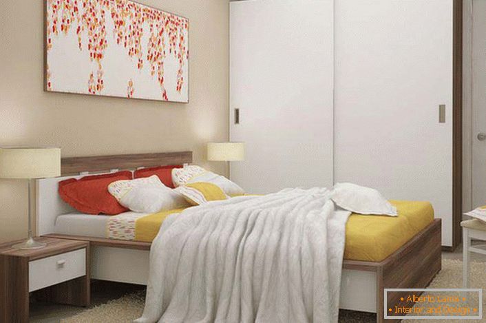 Laconic and functional modular furniture is the right choice for a small bedroom.