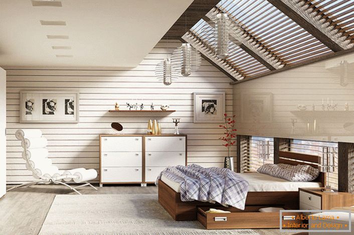 The bedroom on the attic floor in the Scandinavian style is decorated with modular furniture.