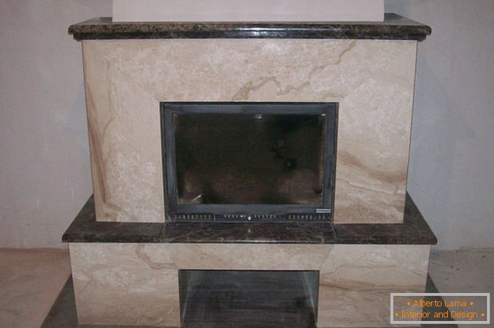 The project of a budgetary fireplace made of marble.