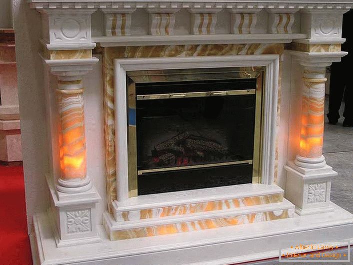 Marble fireplaces as a work of art in the luxurious interior of the Art Nouveau style. 