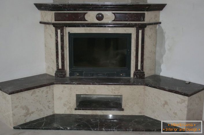 Corner fireplace in black and gray colors. Project for a modern living room.