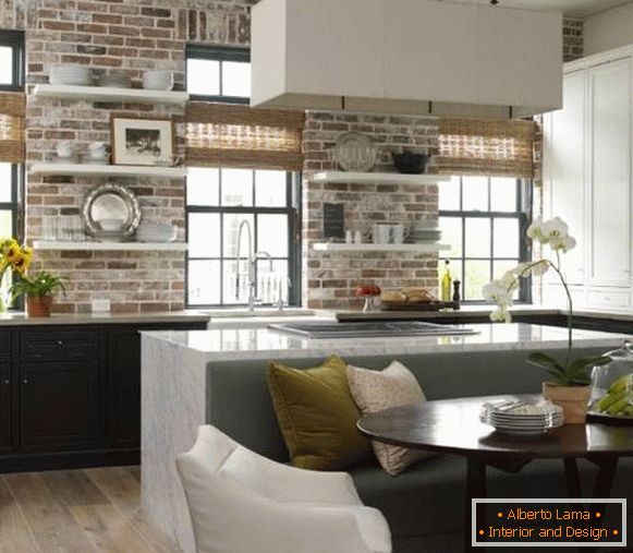 Decorating a brick wall in the interior of the kitchen
