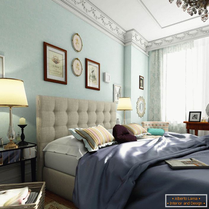 The bedroom in the English style is decorated in soft blue colors. Pastel colors give the effect of visual expansion of space. 