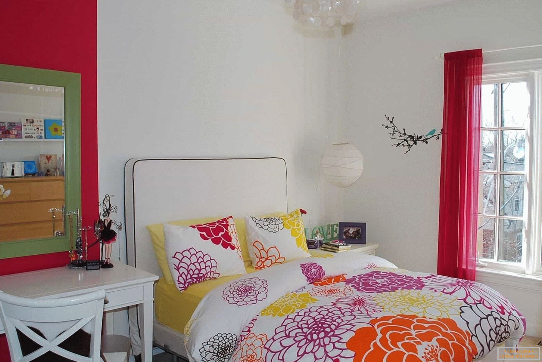 In the white room of a teenage girl - colored bedding and decor elements