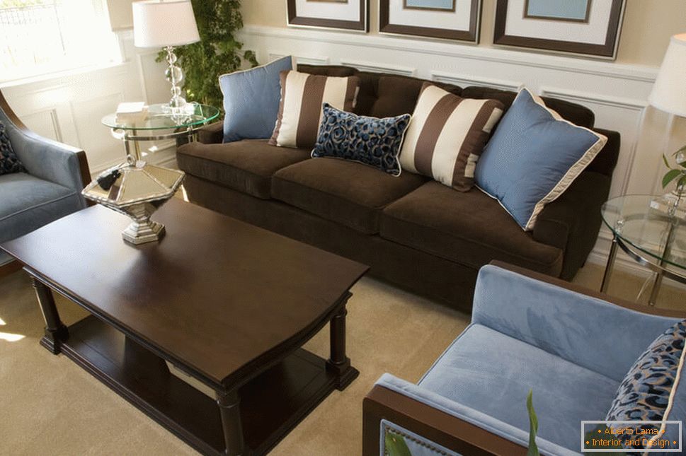 Brown sofa and blue pillows
