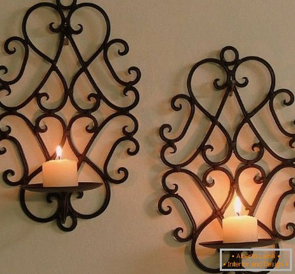 Wall-mounted forged candlestick in classic style