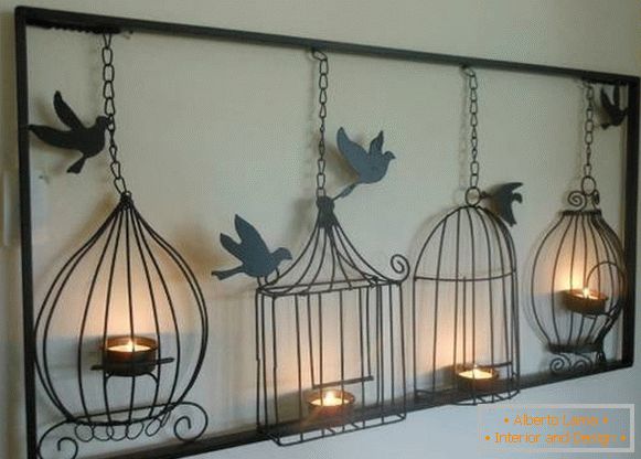 Forged candlesticks in the form of bird cells