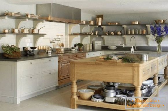 Open shelves of copper tableware in kitchen design