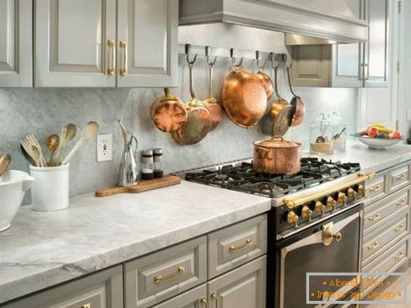 Copper frying pans in kitchen design 2015