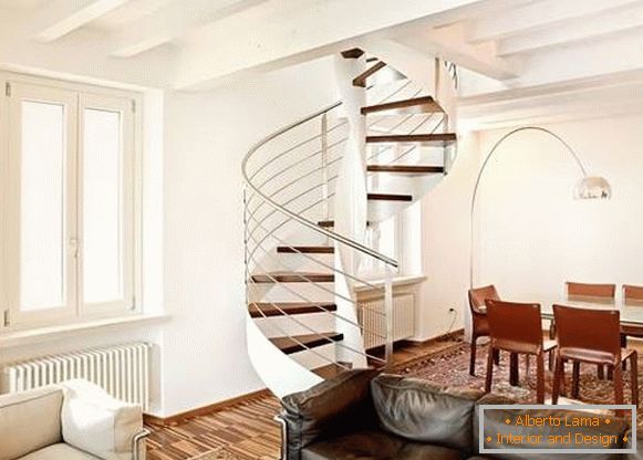Spiral staircase in a private house of wood and metal