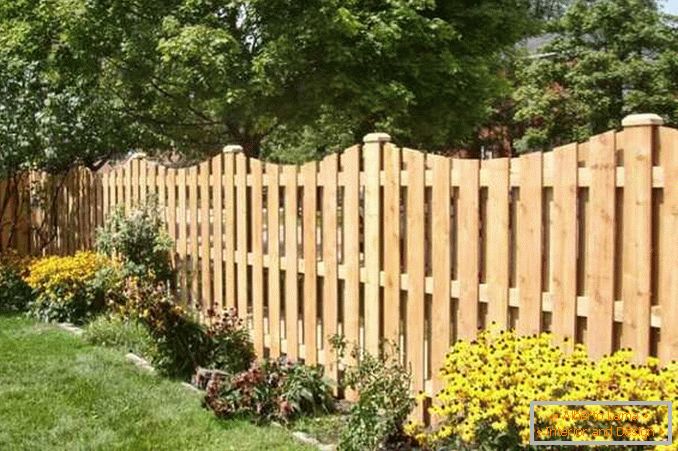 wooden fences for a private house photo