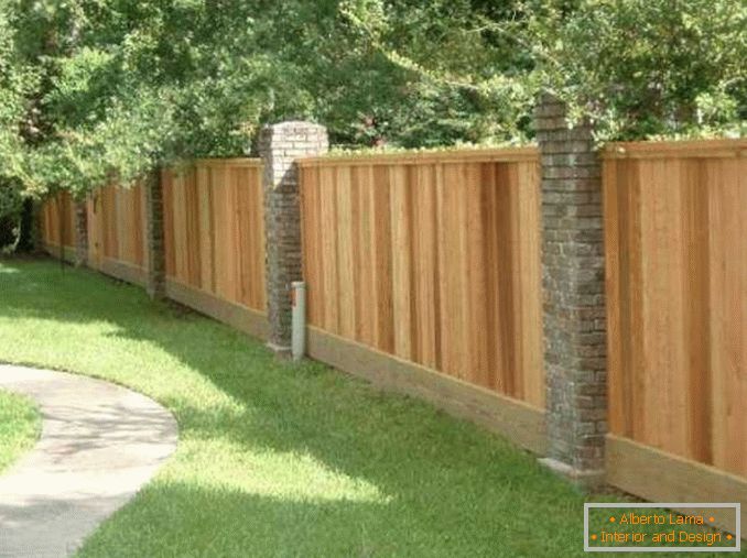 wooden fences for a private house photo