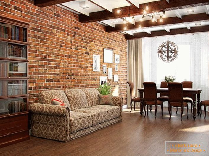 Amazing harmony of the brickwork of the wall under the era of the early 19th century and furniture in the living room.