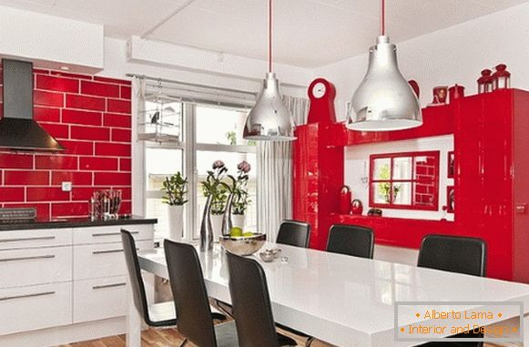The kitchen is red with white photo 14