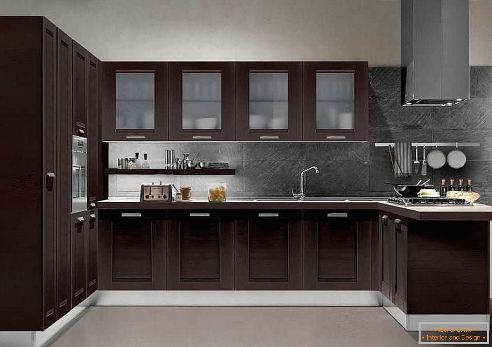 Classical U-shaped kitchen with a hood on the ceiling