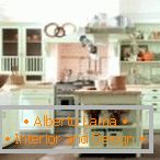 In the bright kitchen there are a lot of white elements