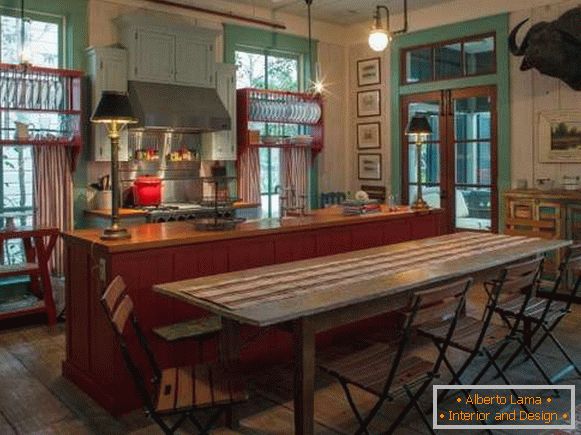 Kitchen design in a rustic style in red and green tones